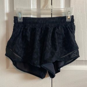 Size 2 lululemon shorts. Black cheetah print pattern
